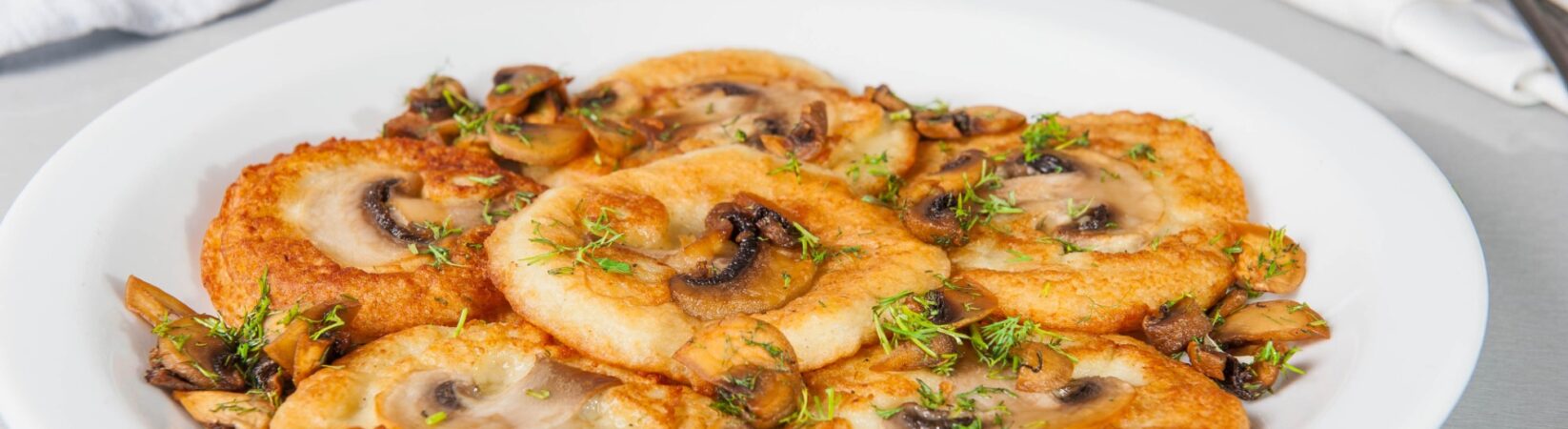 Kartoffelpfannkuchen mit Champignons