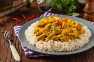 Schweinefleischcurry mit Kürbis und Reis